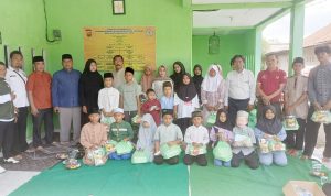 Ujang Nurjaya Ketua Pokdarkamtibmas Bhayangkara Resor Kota Tangerang Beri Santunan Kepada Anak Yatim dan Piatu