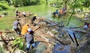 Antisipasi Luapan Danau Sentani, Koramil Sentani Bersama Warga Normalisasi Kali Jaifuri