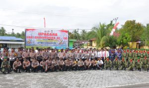 Sinergi TNI-Polri Makin Solid! Prajurit Yonif TP 860/NSK Hadiri Upacara HUT Bhayangkara ke-80 di Waropen