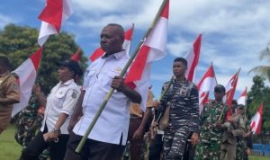 Semarak Patriotisme di Bumi Sarmi: Yonif TP 809/NTM Bersama Elemen Masyarakat Gelar Kirab Merah Putih