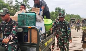 Motor Roda Tiga Jadi Tulang Punggung Transportasi Satgas TMMD ke-129 di Kampung Wanam
