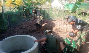 Buis Beton Sumur Galian, Mulai Dipasang Oleh Personel Satgas TMMD ke-129 di Wanam