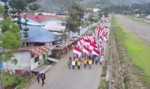 Papua Damai, Kirab Merah Putih di Tolikara Kobarkan Semangat Nasionalisme Jelang HUT ke-81 Kemerdekaan RI