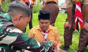 Yonif TP 860/NSK Latih Kepramukaan dan Wawasan Kebangsaan Siswa MTs Ma’arif NU Waropen
