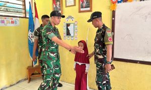 Yonif TP 860/NSK Gelar Pemeriksaan Kesehatan Gratis bagi Siswa SD Inpres Waren